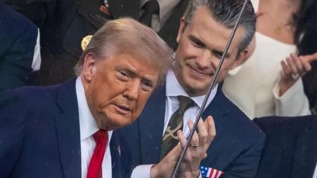U.S. Secretary of Defense Pete Hegseth and U.S. President Donald Trump attend the U.S. Army's 250th Birthday parade