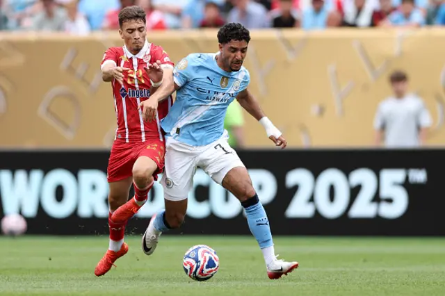 Oussama Zemraoui (L) and Manchester City's Egyptian striker #07 Omar Marmoush fight for the ball