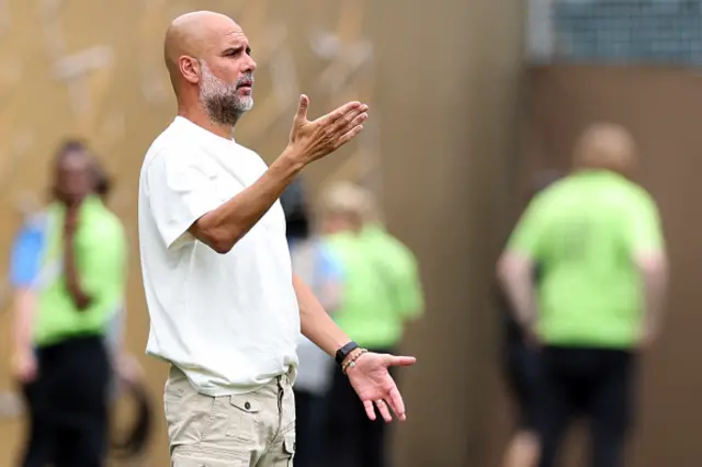 Manchester City's Spanish head coach Pep Guardiola gestures