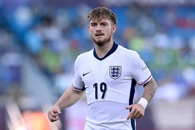 Harvey Elliott of England looks on