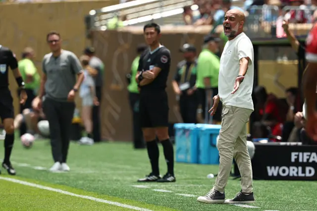 Manchester City's Spanish head coach Pep Guardiola reacts