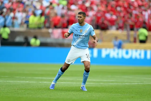 Rodri of Manchester City looks on