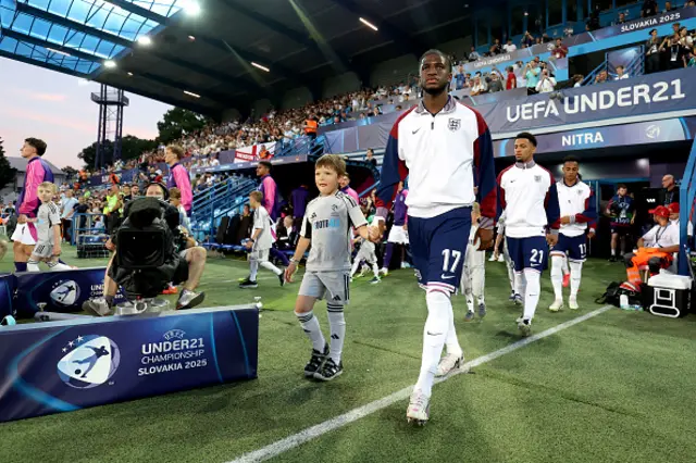 Samuel Iling-Junior of England walks out
