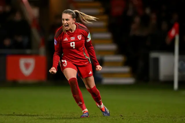 Wales striker Kayleigh Barton celebrates