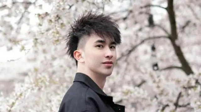 Zhenhao Zou, a Chinese student who was found guilty by a London court of drugging and raping 10 women in Britain and China, looks on in this handout picture released on March 5, 2025.