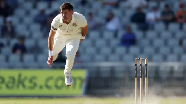 James Anderson in action, bowling for Lancashire