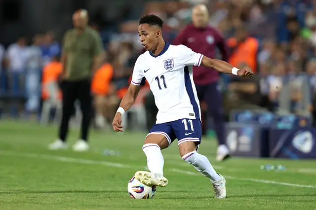 Omari Giraud-Hutchinson of England runs with the ball