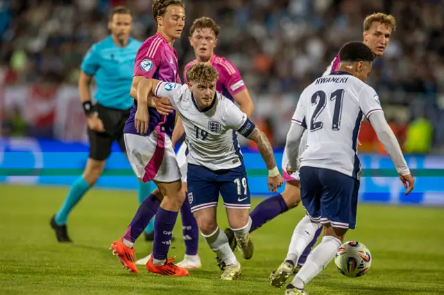 Harvey Elliott  looks on