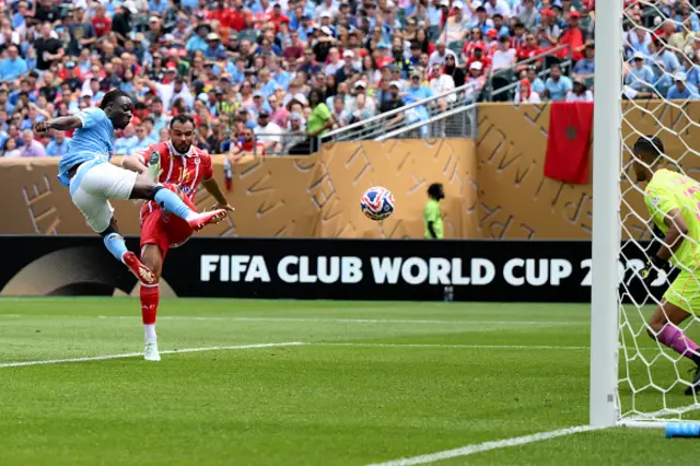Jeremy Doku of Manchester City scores