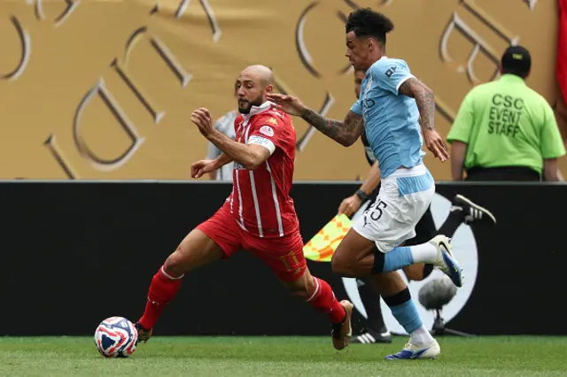 Nordin Amrabat and Manchester City's English midfielder #75 Nico O'Reilly fight for the ball