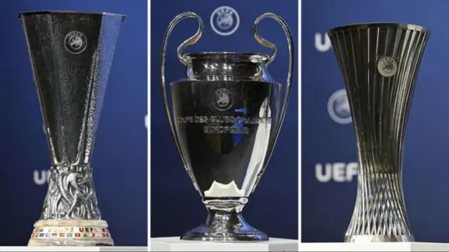 The Europa League, Champions League and Conference League trophies on display