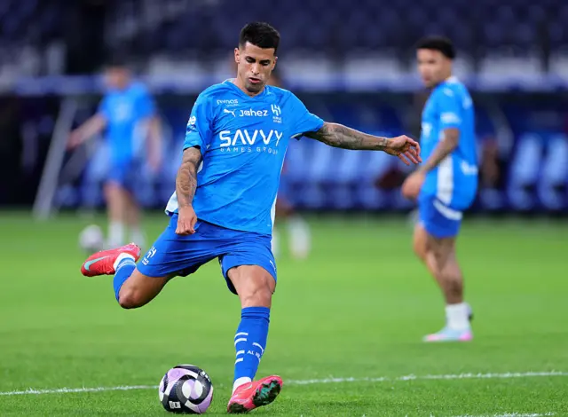 Cancelo kicking the ball