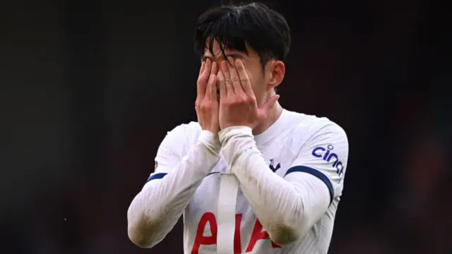 Son Heung-Min of Tottenham Hotspur looks dejected