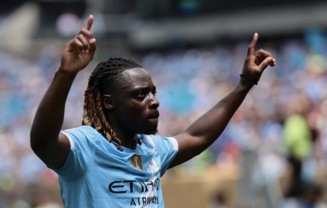 Manchester City's Jeremy Doku celebrates scoring their second goal