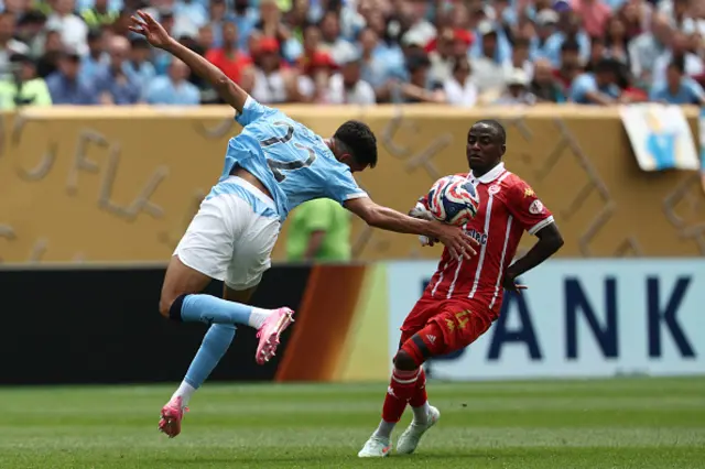 Vitor Reis and WAC Casablanca's South African forward #04 Thembinkosi Lorch fight for the ball