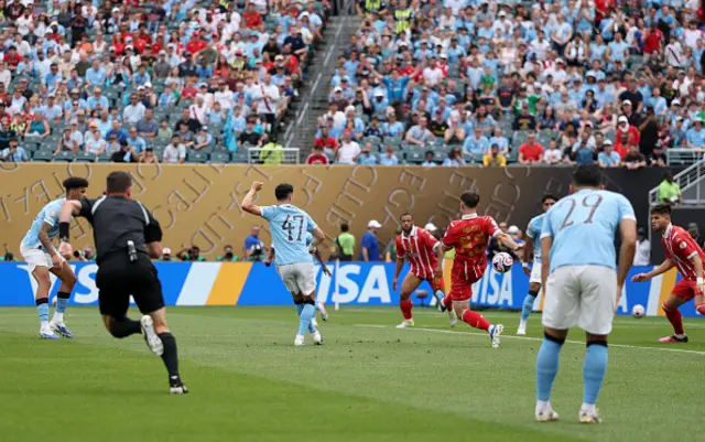Phil Foden #47 of Manchester City scores his team's first goal