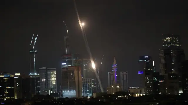 sraeli anti missile defence try to intercept Iranian ballistic missiles over the sky of Tel Aviv