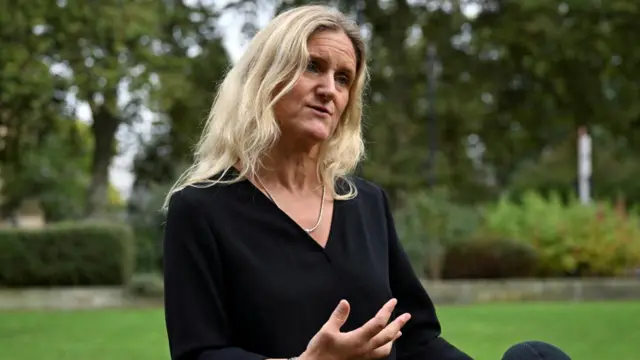 Kim Leadbeater speaks during an interview about the Assisted Dying Bill in London. She wears a black top.