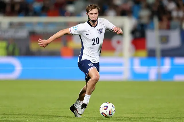 Alex Scott of England runs with the ball