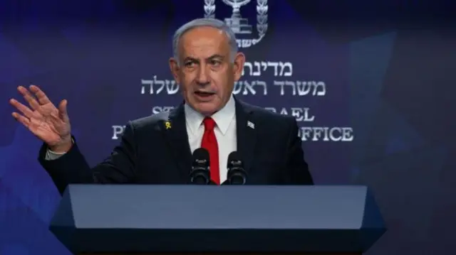 Israeli Prime Minister Netanyahu speaking at a podium