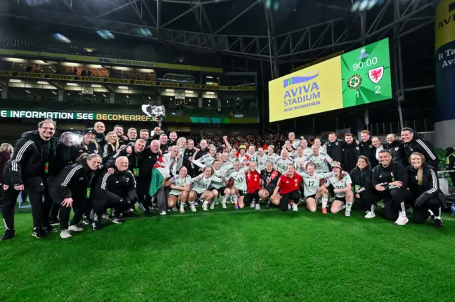 Wales players and coaches celebrate