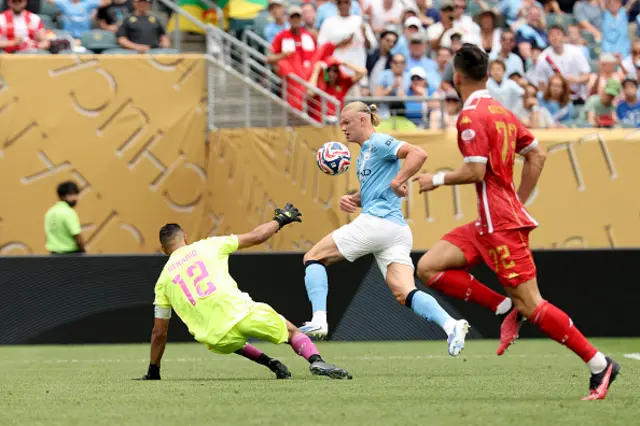 Erling Haaland #9 of Manchester City takes a shot