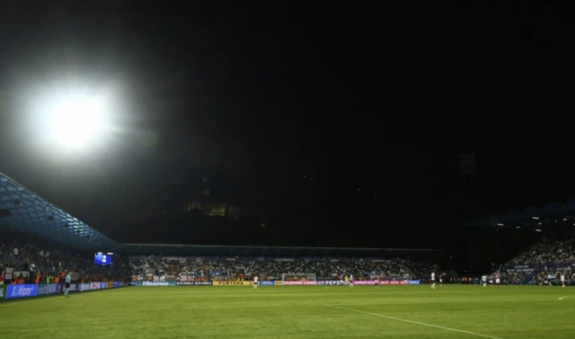 General view as the floodlights are cut out during the match