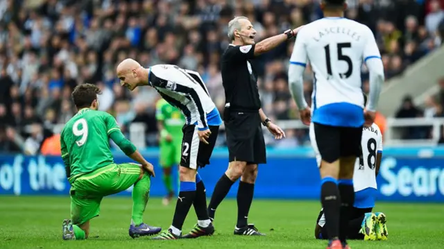 Jono Shelvey confronts Fabio Borini