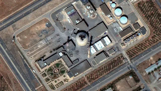 This image - taken on 19 June - shows damage to the top of the reactor in the centre of the picture