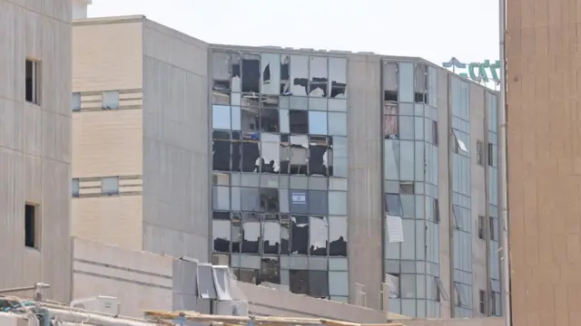 A view of the Soroka hospital complex shows broken and missing windows.