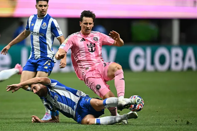 Tadeo Allende (C) is tackled