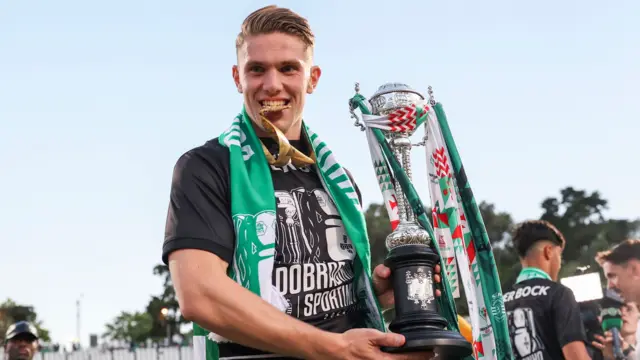 Viktor Gyokeres holding the Portuguese Cup trophy after Sporting win the 2025 final