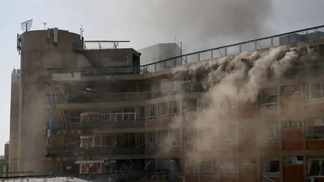 Smoke billows from the hospital complex in Israel.