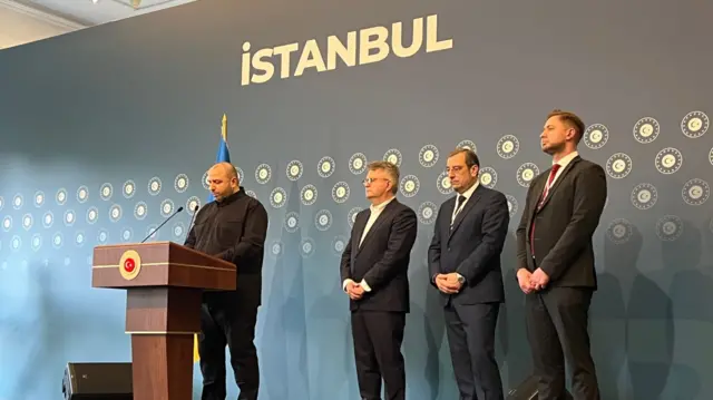 Rustem Umerov stands at a podium - the background reads 'Istanbul'