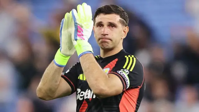 Emiliano Martinez of Aston Villa acknowledges the fans
