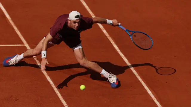Jack Draper stretches for a forehand
