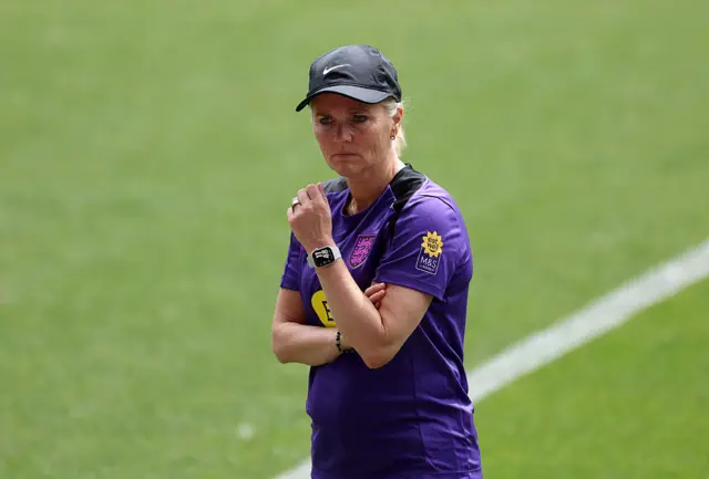 Sarina Wiegman standing in England training