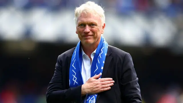 Everton manager David Moyes gestures towards the supporters