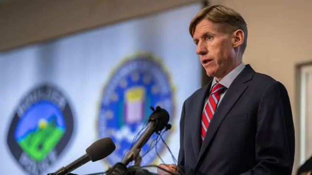 Boulder County District Attorney Michael Dougherty speaks at a news conference