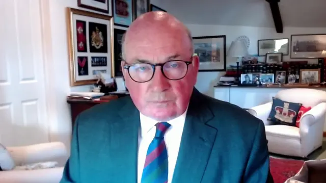Lord Dannatt looks to camera during an interview - he appears to be speaking from his home
