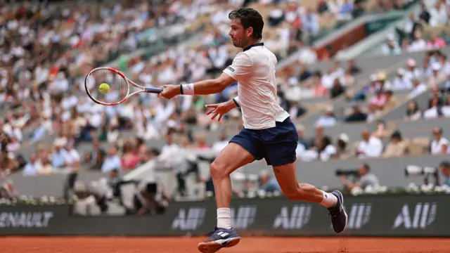 Cameron Norrie of Great Britain plays a forehand