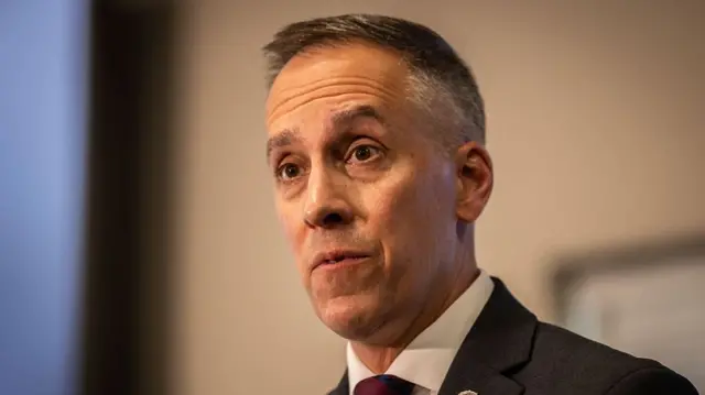 FBI special agent Mark Michalek gives an update at a press conference