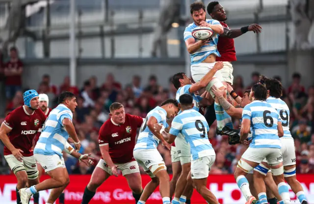 Maro Itoje jumps for the ball at a line-out