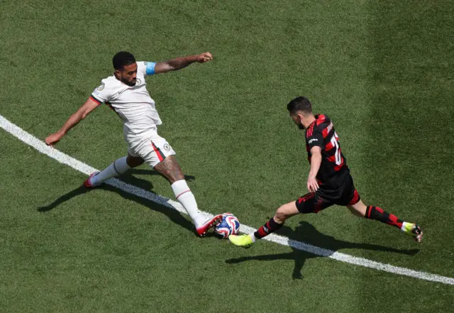James and Jorginho lunge for a loose ball