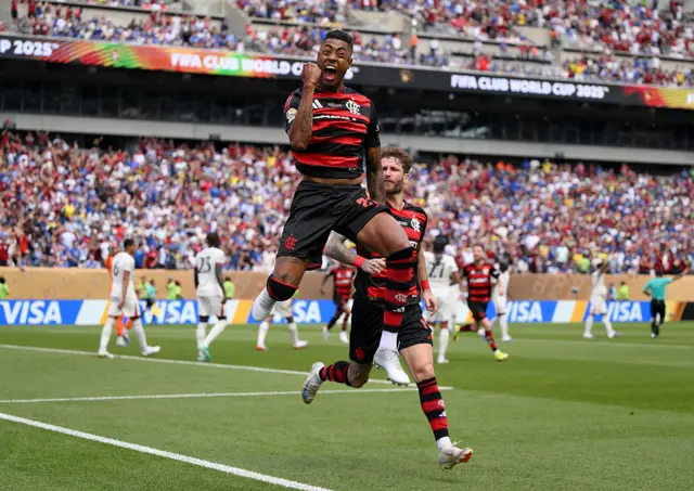 Henrique celebrates his goal in front of the fans