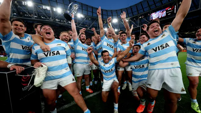 Argentina celebrate lifting the 1880 Cup