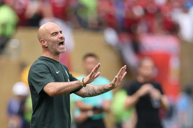 Maresca shouts and waves his arms from the touchline