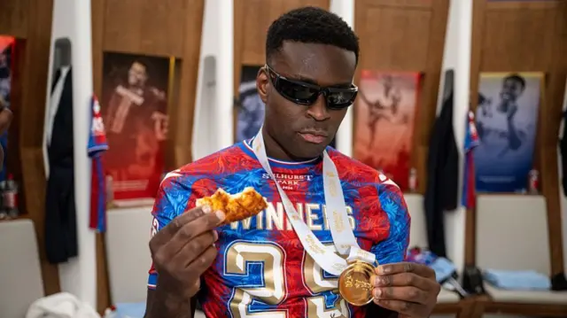 Marc Guehi shows off his FA Cup winners medal