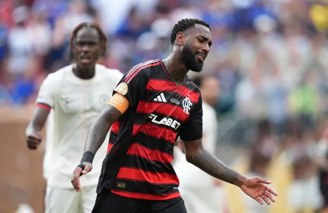 A flamengo player reacts to a missed chance