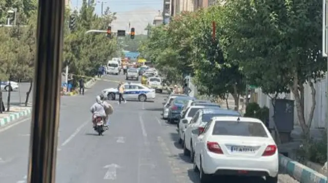 A taped off road in Tehran this morning